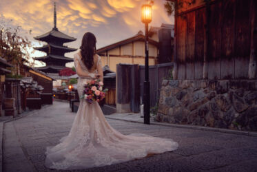 Japanese bride stand on the read to Yasaka pagoda in kyoto city in her pre wedding activity, Kyoto, Japan